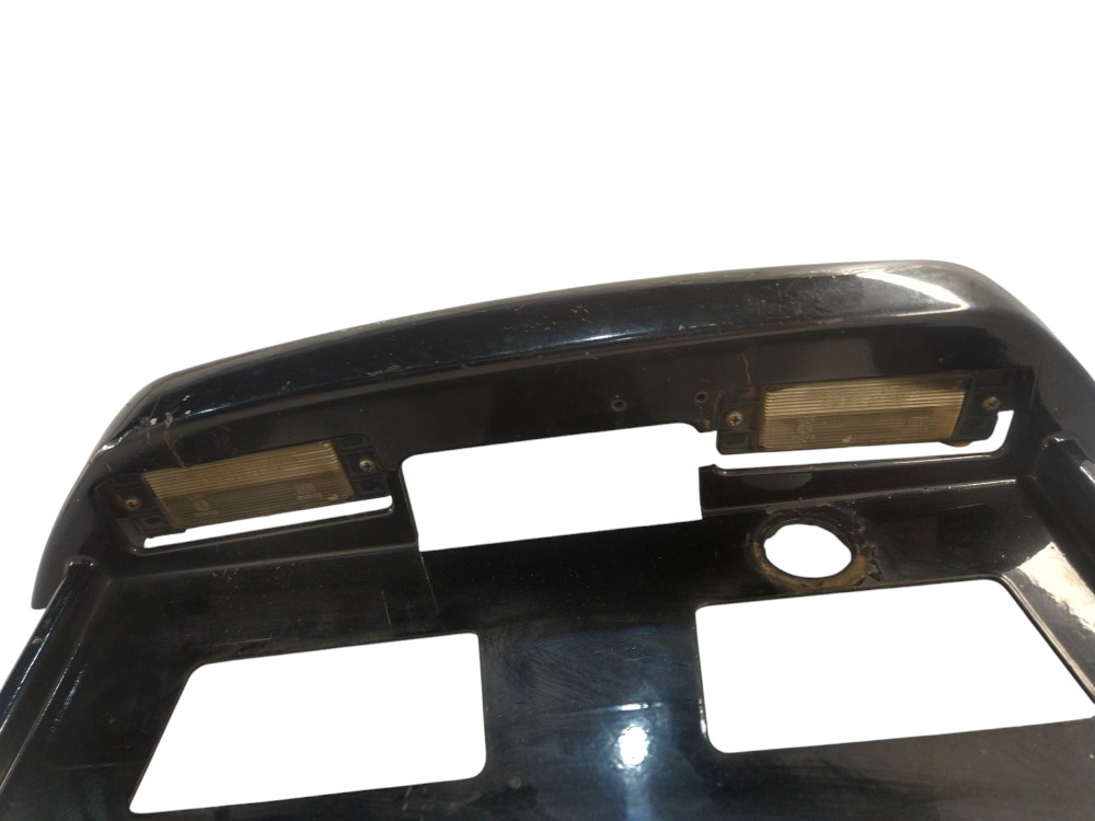 MOLDURA LUZ DE PLACA PAJERO SPORT 2001/2004 2