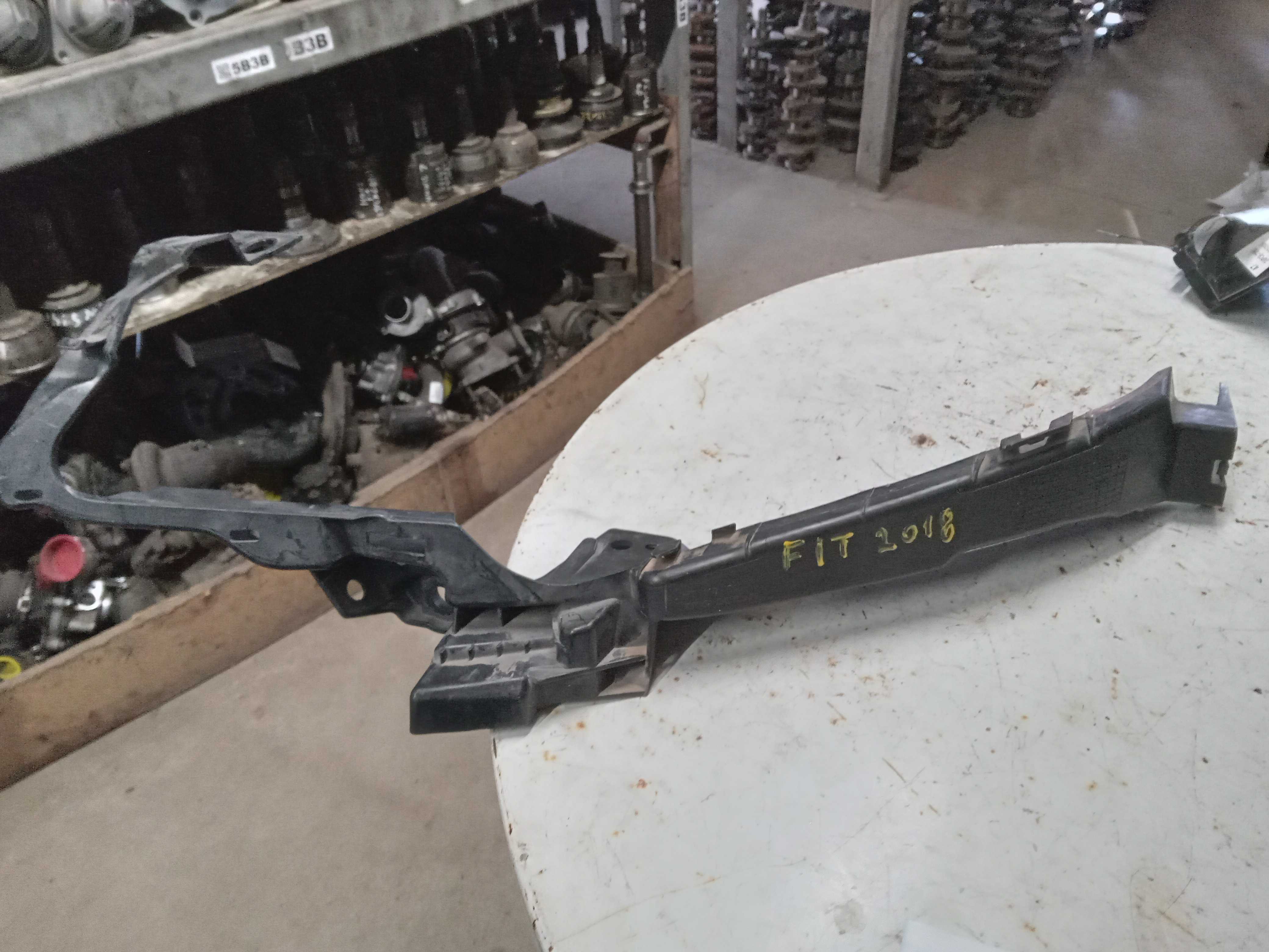 SUPORTE FAROL LADO ESQUERDO HONDA FIT 2018 1