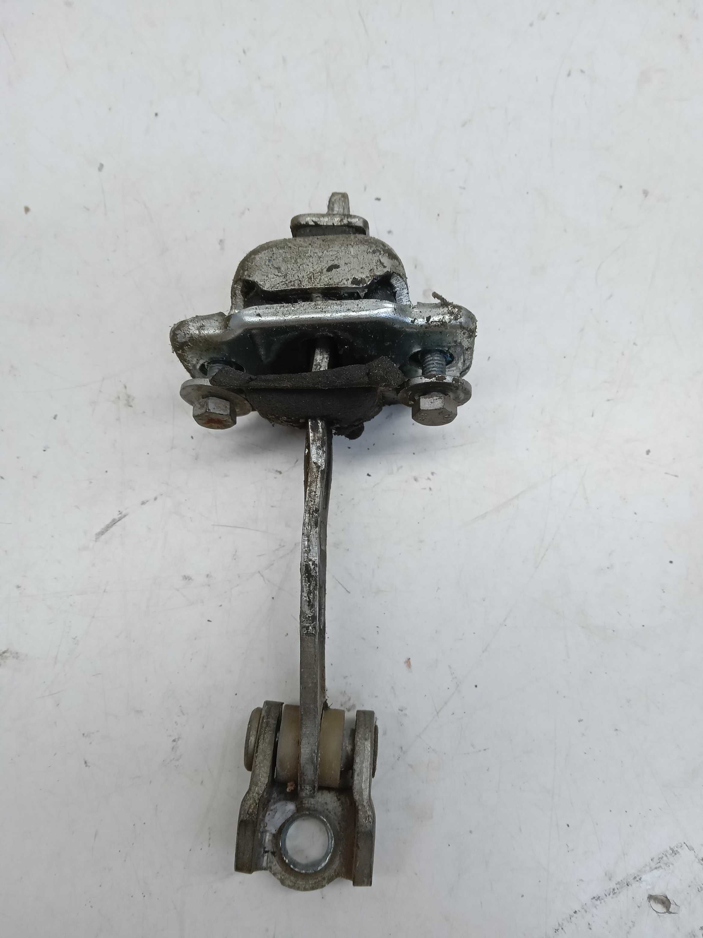 LIMITADOR PORTA DIANTEIRA LD GM CELTA 2005 1