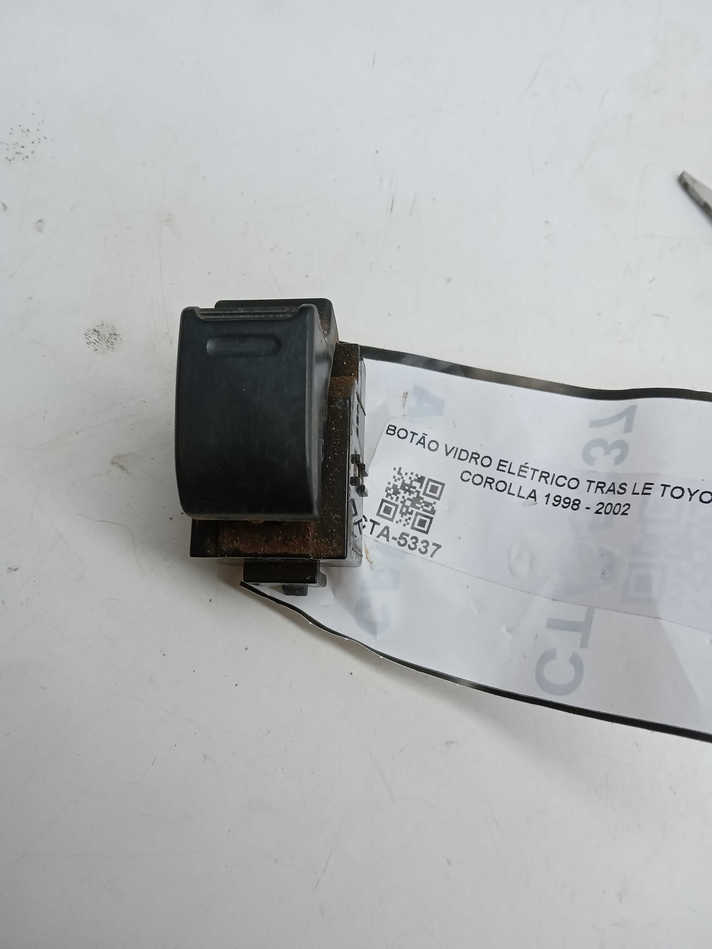 MOLDURA COMANDO BOTAO VIDRO TRASEIRO LE TOYOTA COROLLA 2002 1