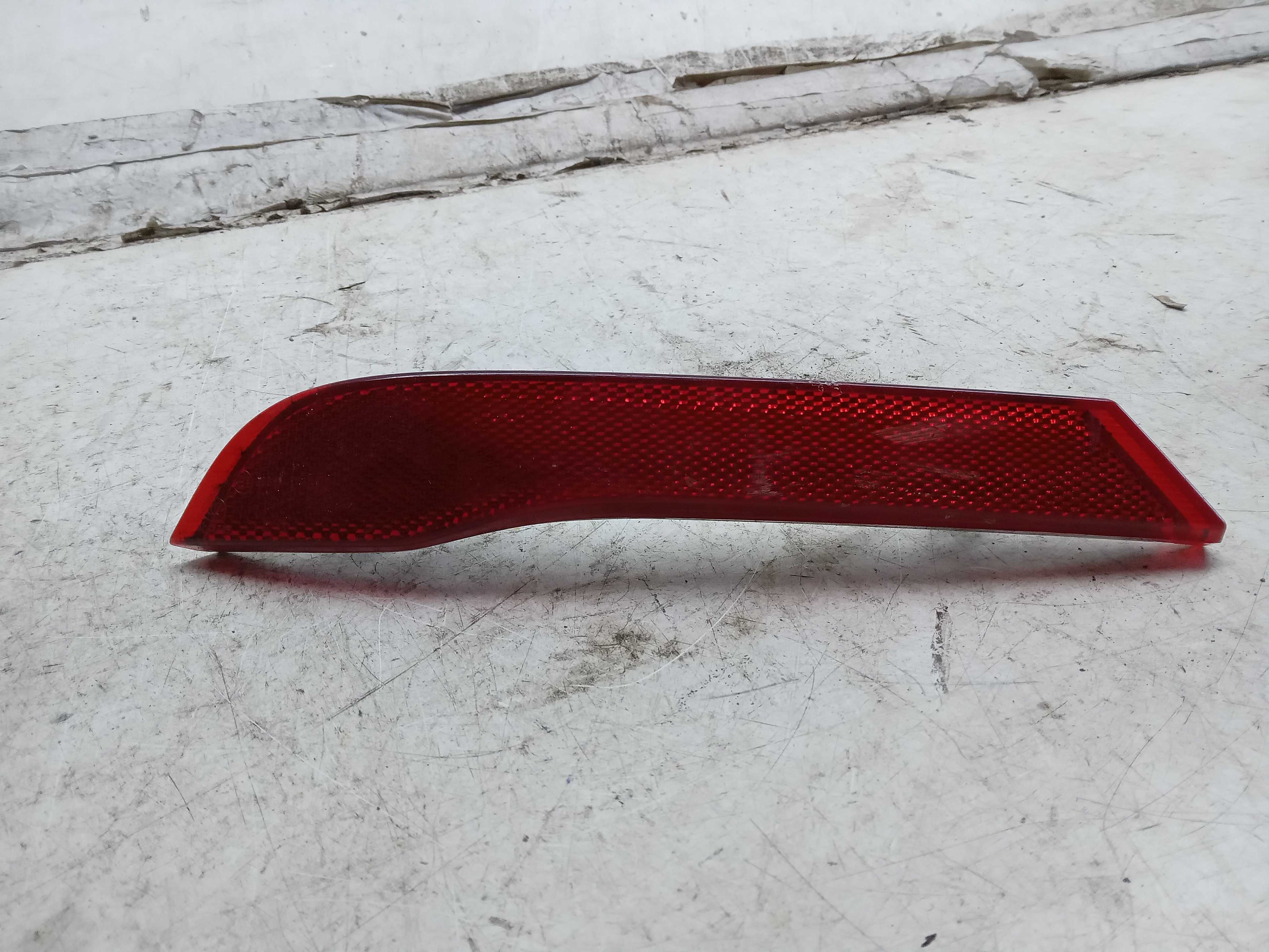 REFLETOR OLHO GATO PARACHOQUE TRASEIRO LE GM TRACKER 2019/22