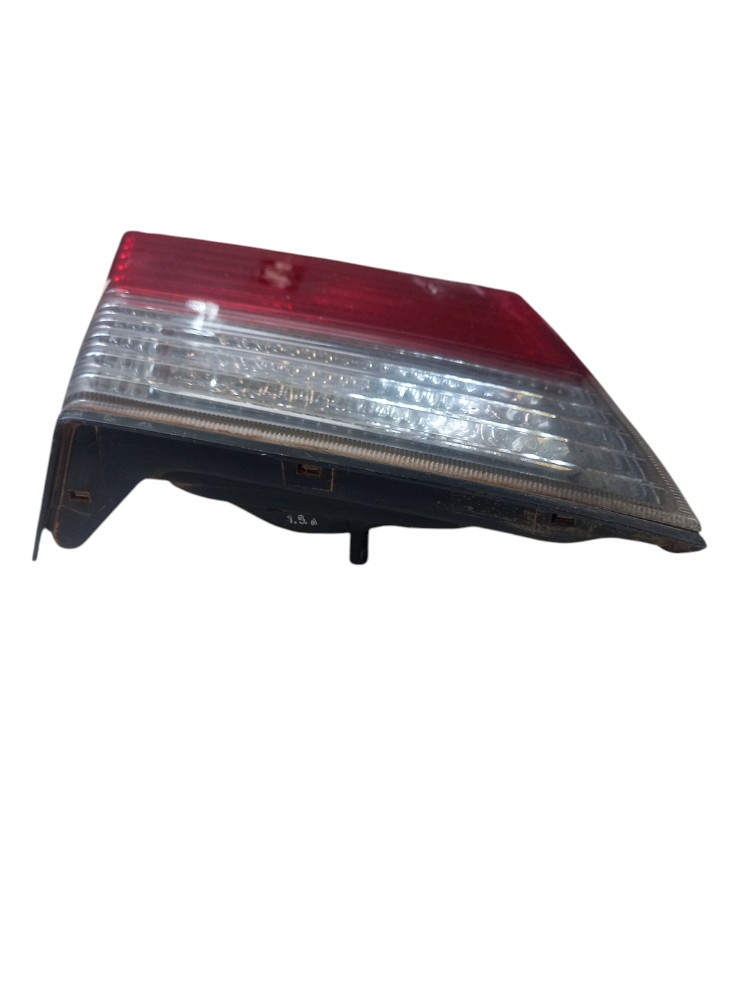 Lanterna esquerda Nissan primeira gxe 1998