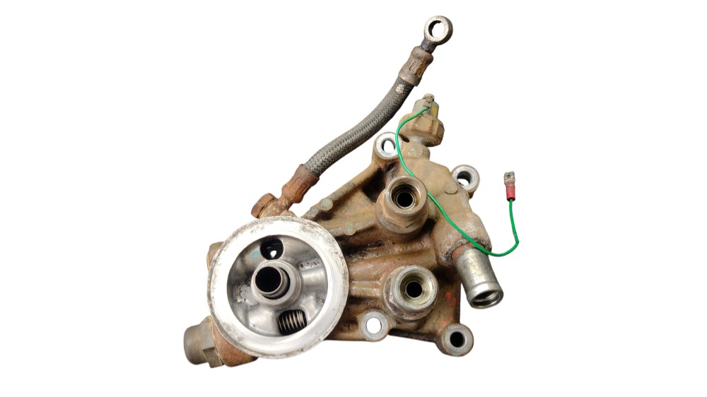 Suporte filtro óleo motor L200 2.5 diesel 2005