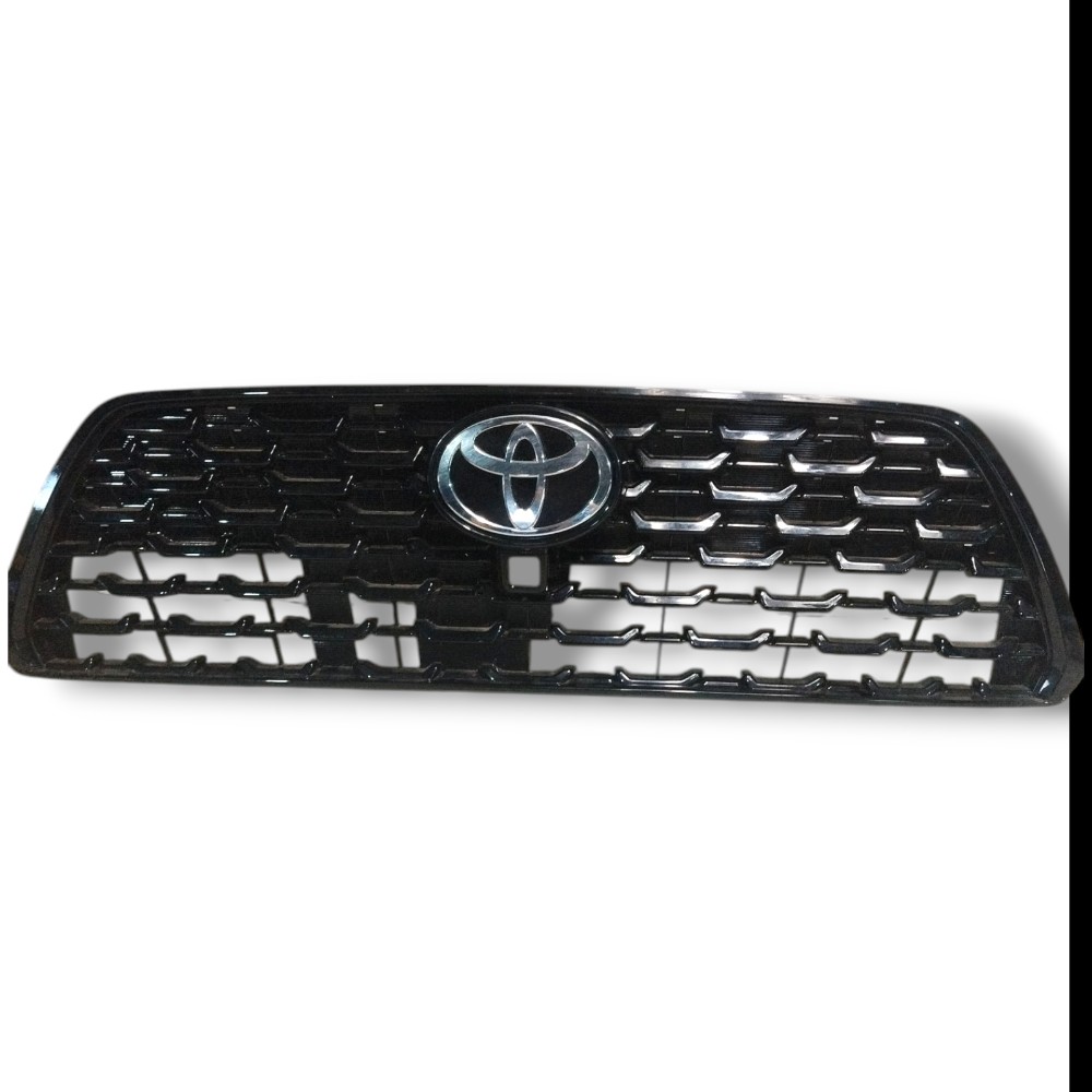 Grade dianteira com o emblema do Toyota Yaris Cross 2026