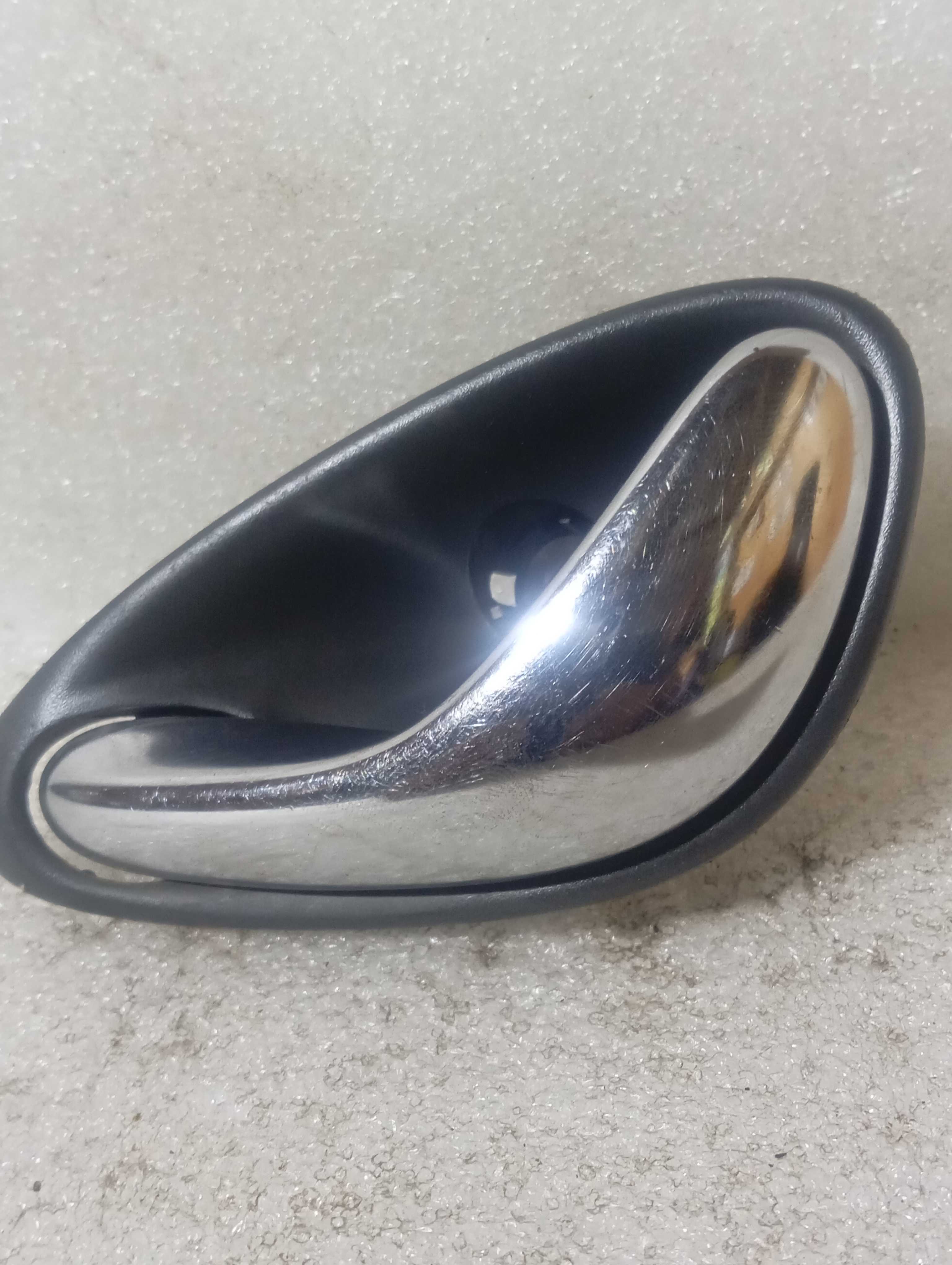 Maçaneta interna do Omega Australiano lado esquerdo diant