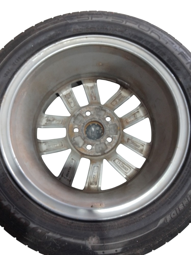 Roda aro 15 Volkswagen Fox original pneu meia vida prata 2