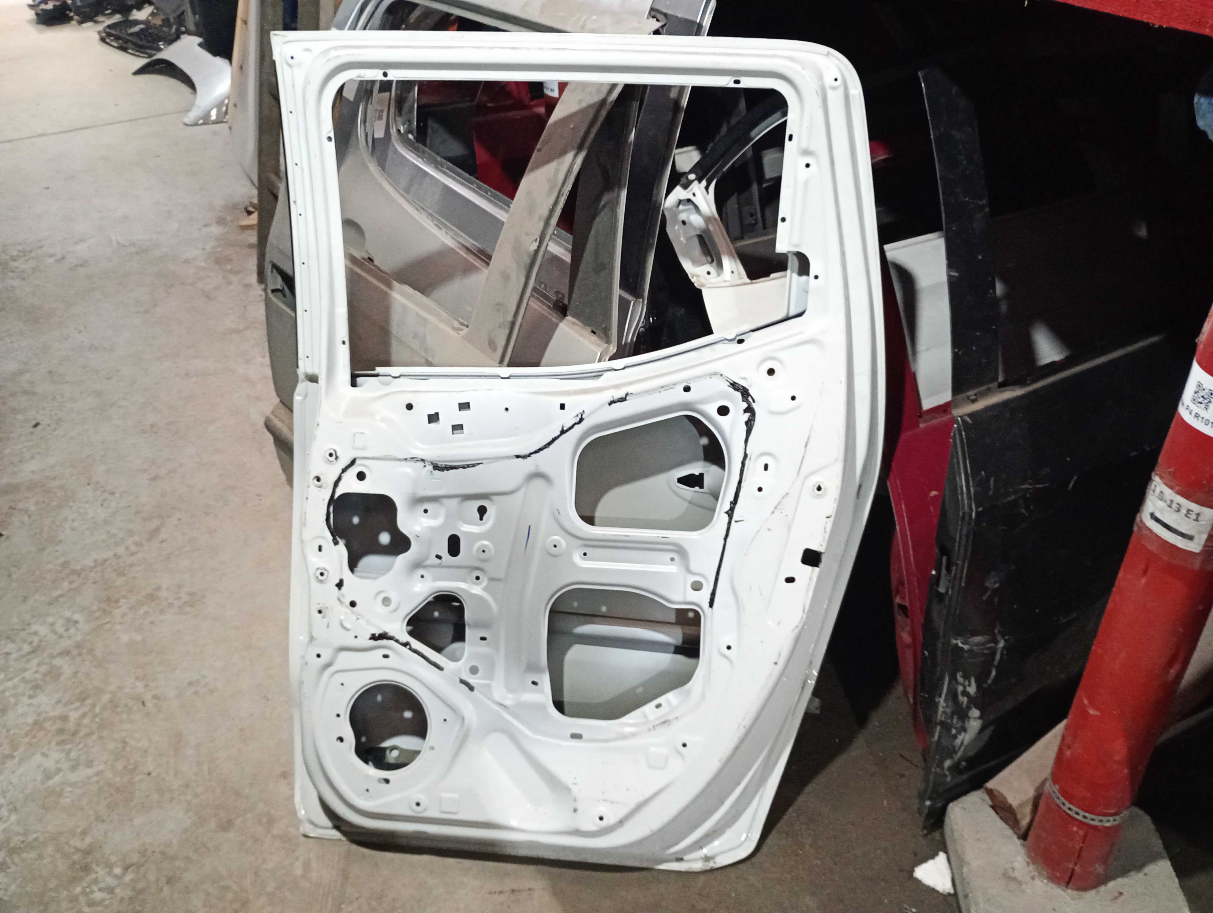 Porta traseira direita Nissan Frontier 2017/2023 2