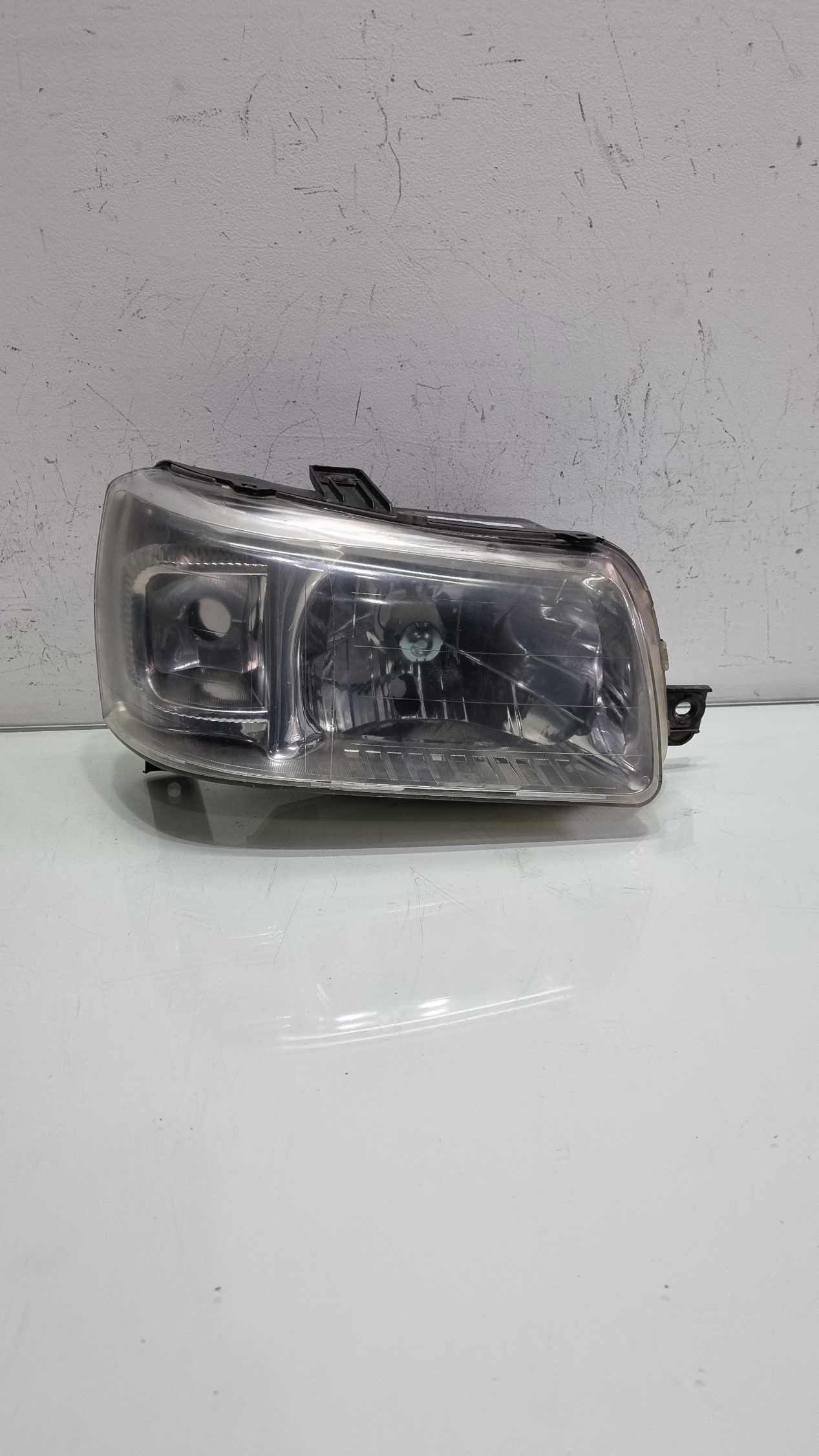 Farol lado direito Fiat Uno Fire 2005/2010 2