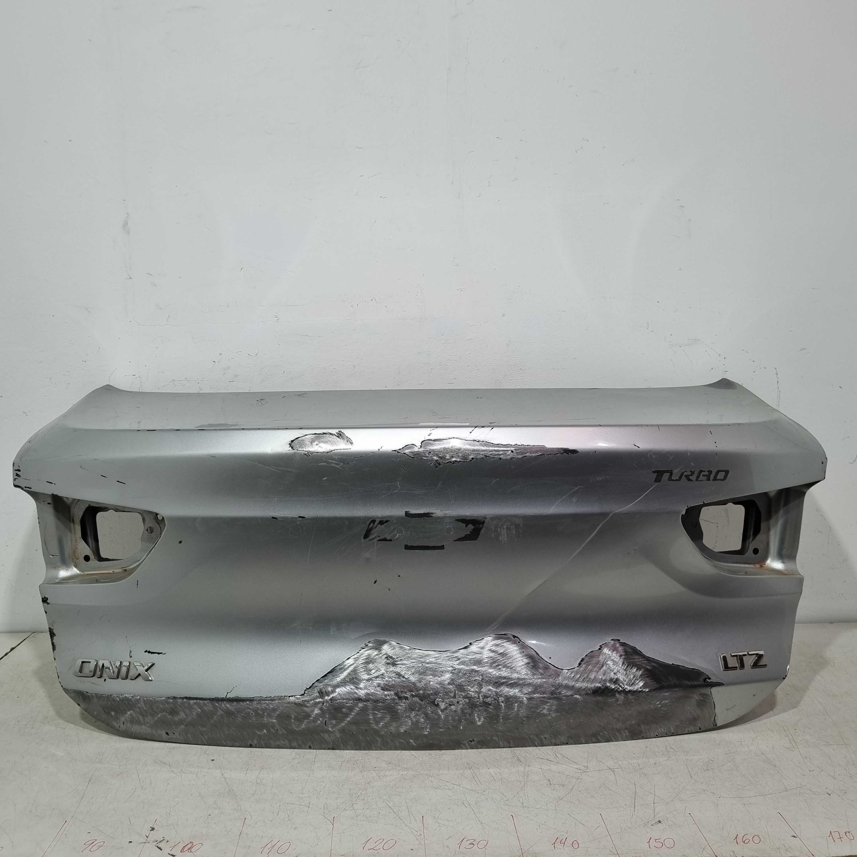 Tampa Traseira Chevrolet Onix sedan 2020/2024 Recondicionado